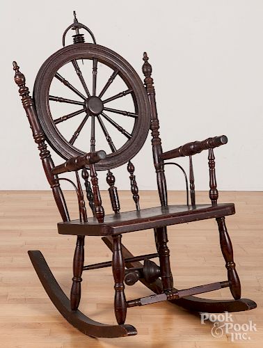 Spinning wheel rocking chair