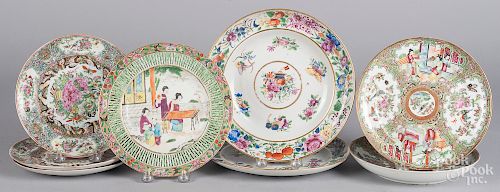 Eight Chinese export porcelain famille rose plates