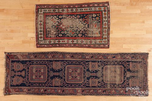 Two oriental throw rugs