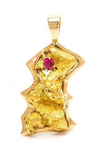 * A 14 Karat Yellow Gold, Gold Nugget and Ruby Pendant, 34.90 dwts.
