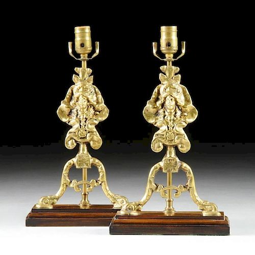 A PAIR OF REGENCE REVIVAL POLISHED BRASS CHENET FORM LAMPS, PARTIALLY LATE 19TH CENTURY,