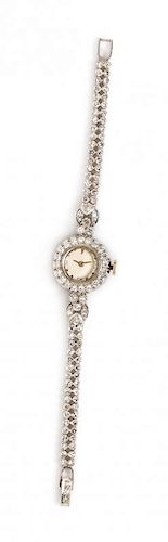A Platinum and Diamond Wristwatch, Paul Vallette, 17.60 dwts.