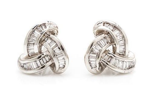 A Pair of 18 Karat White Gold and Diamond Earclips, 4.60 dwts.
