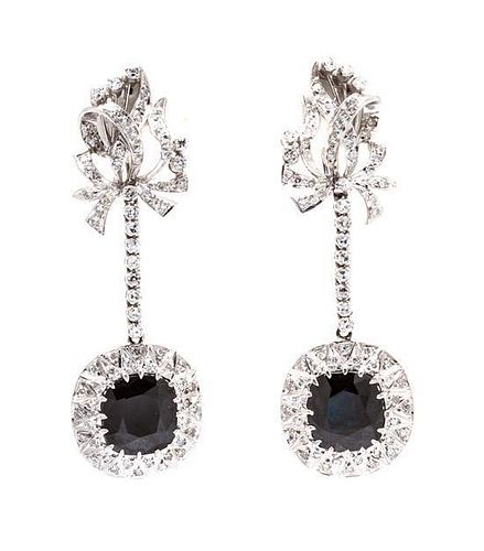 A Pair of 14 Karat White Gold, Diamond and Sapphire Earrings, 13.10 dwts.