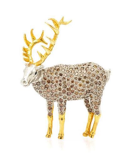 * An 18 Karat Gold and Colored Diamond Reindeer Brooch, 17.80 dwts.