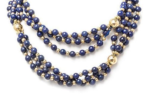* A Single Strand 14 Karat Yellow Gold and Lapis Lazuli Bead Necklace,