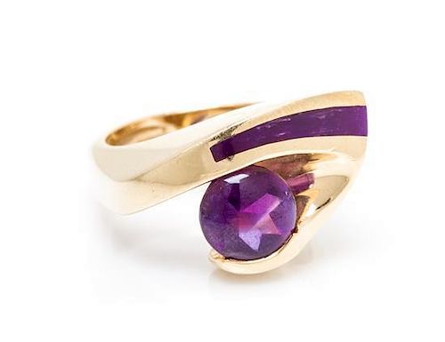 A 14 Karat Yellow Gold, Amethyst and Sugilite Ring, 7.70 dwts.