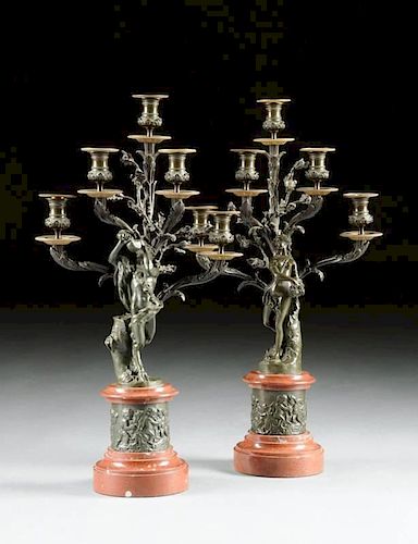 A PAIR OF LOUIS XVI STYLE PATINATED BRONZE AND ROUGE GRIOTTE MARBLE FIVE LIGHT CANDELABRA, SIGNED CLODION, LATE 19TH CENTURY,