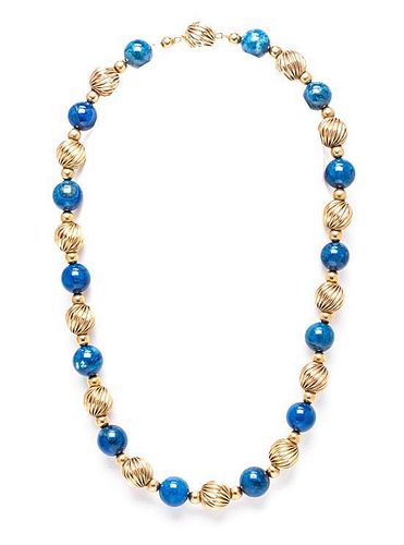 A 14 Karat Yellow Gold and Sodalite Bead Necklace, 21.10 dwts.