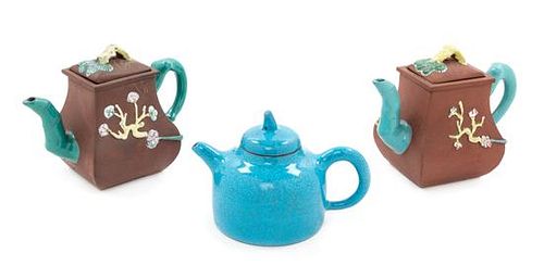 Three Chinese Yixing Pottery Teapots Height of tallest 5 1/2 inches.