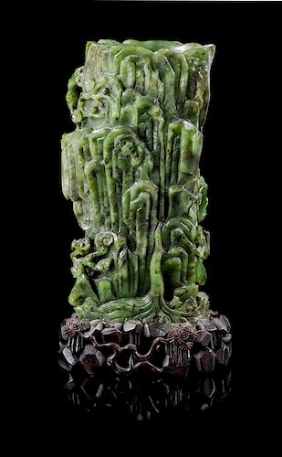 A Chinese Mottled Spinach Jade Vase Height 8 1/2 inches.