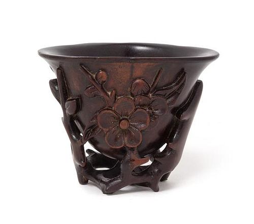 A Chinese Carved Wood Libation Cup Height 3 inches.