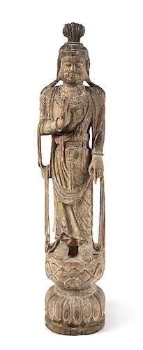 * A Chinese Painted Carved Wood Figure of Guanyin Height 54 1/4 inches.