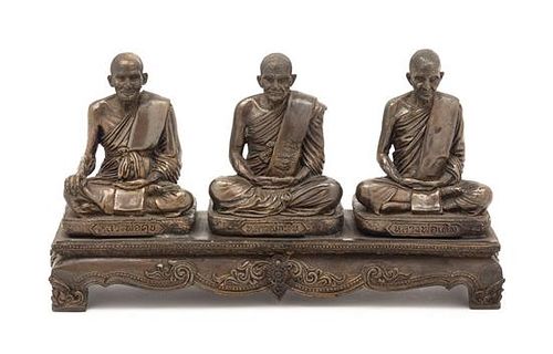 A Thai Bronze Figural Group Height 5 inches.