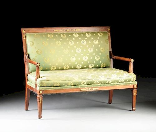 AN EMPIRE STYLE GILT BRONZE MOUNTED MAHOGANY SETTEE, LATE 19TH/EARLY 20TH CENTURY,