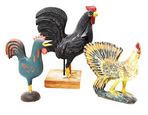 3 carved wooden chickens
