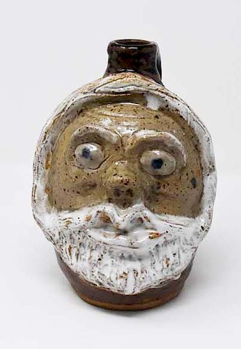 Grotesque jug, signed Marie Rogers