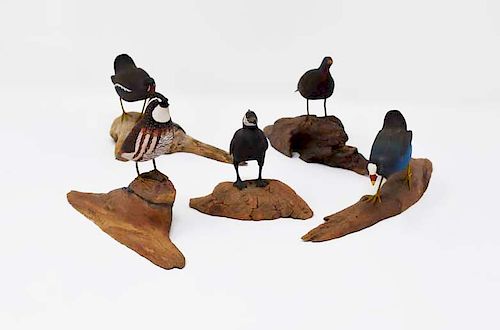 5 wooden bird carvings on wood bases