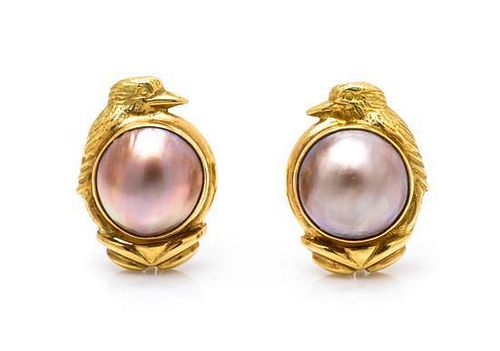 A Pair of 18 Karat Yellow Gold and Mabe Pearl Earclips, 13.10 dwts.
