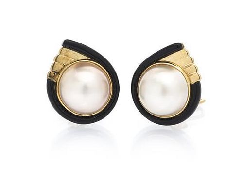 A Pair of 14 Karat Yellow Gold, Onyx and Mabe Pearl Earclips, 11.60 dwts.
