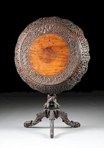 A BRITISH COLONIAL  CARVED LABURNAM TEA TABLE, POSSIBLY INDO PERSIAN OR CEYLON, MID 19TH CENTURY,