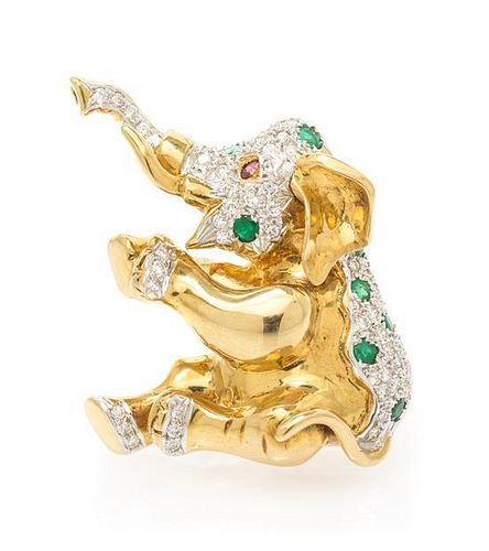 * An 18 Karat Yellow Gold, Diamond, Emerald and Ruby Articulated Elephant Pendant/Brooch, 12.10 dwts.