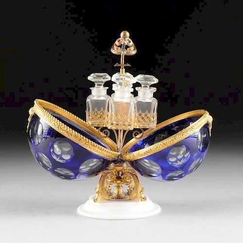 A CONTINENTAL COBALT BLUE CUT TO CLEAR CRYSTAL EGG SHAPE MECHANICAL SCENT CASKET, PROBABLY BOHEMIAN, CIRCA 1880,