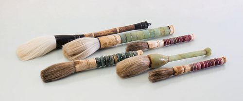 GROUP OF SIX CHINESE JADE, HARDSTONE, BAMBOO AND BONE FLY WHISKS