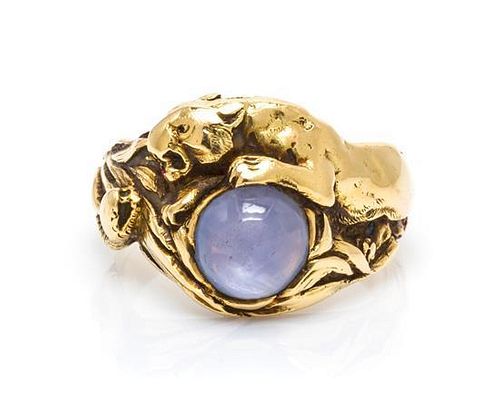 * A 14 Karat Yellow Gold and Star Sapphire Ring, 9.80 dwts.