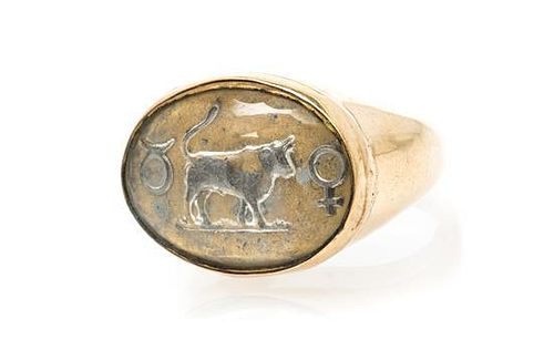 * An Antique Yellow Gold and Essex Crystal Zodiac Symbol Ring, 10.30 dwts.