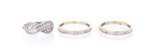 A Group of 14 Karat Gold and Diamond Rings, 3.70 dwts.