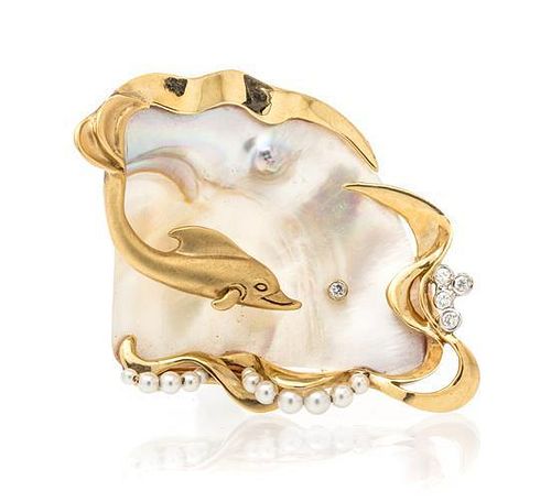 * A 14 Karat Yellow Gold, Mother-of-Pearl, Diamond and Cultured Pearl Dolphin Brooch, 21.10 dwts.