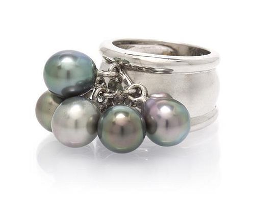 * An 18 Karat White Gold and Cultured Pearl Ring, 15.90 dwts.