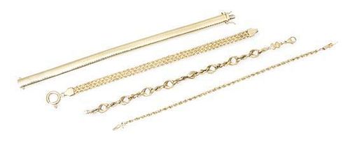 A Collection of 14 Karat Yellow Gold Bracelets, 36.70 dwts.