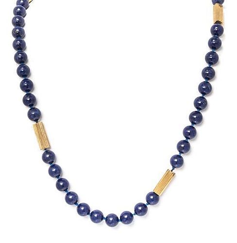 A Single Strand 14 Karat Yellow Gold and Lapis Lazuli Bead Necklace,