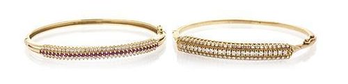 A Collection of 14 Karat Yellow Gold, Diamond and Ruby Bangle Bracelets, 19.20 dwts.
