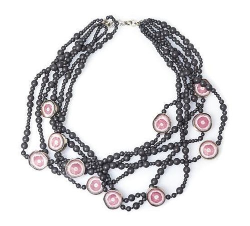 * A 14 Karat White Gold, Rhodochrosite and Glass Bead Multistrand Necklace,