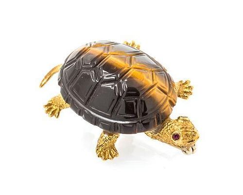* An 18 Karat Yellow Gold, Tiger's Eye and Ruby Turtle Brooch, 8.90 dwts.