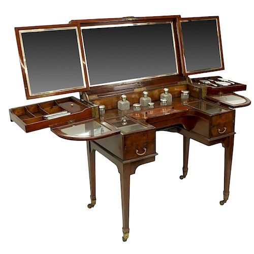 Attributed to: George Betjeman & Sons Circa 1910 Edwardian Mahogany Enclosed Dressing Table. The rectangular hinged top enclosing an interior fitted w