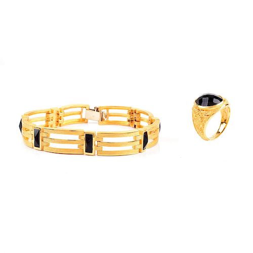 Man's Vintage Prima Criss Cross Cut Black Diamond and 24 Karat Yellow Gold Ring together with Prima 18 Karat Yellow Gold and Black Onyx Bracelet. Sign