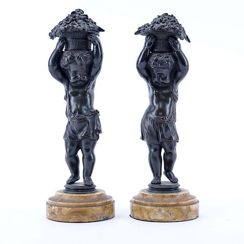 Pair of 19/20th Century Continental Bronze Putti Figures With Baskets on Sienna Marble Bases. Unsigned.