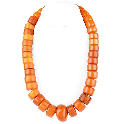 Large Antique Graduated Amber Beaded Necklace, Possibly Tibetan. Natural deep color tones with typical stress lines to a few beads overall good condit