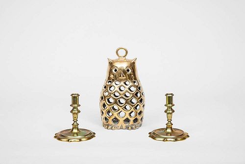 Brass Owl-Form Lantern and a Pair of Brass Candlesticks