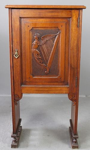 Walnut Cabinet with Harp Decoration