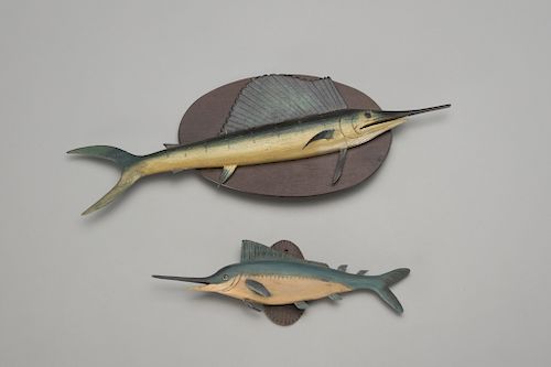 Two Miniature Carved Fish Plaques