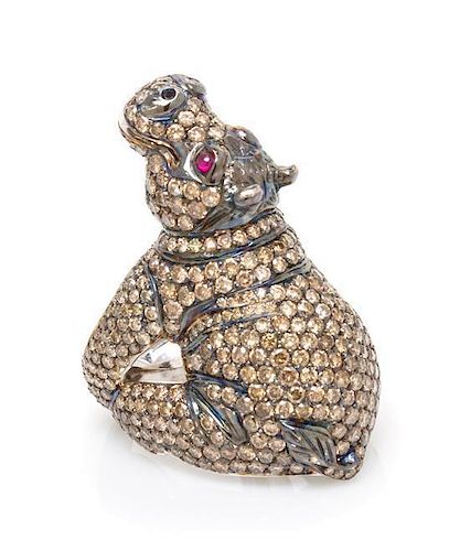 An 18 Karat White Gold, Colored Diamond and Ruby Hippo Ring, 22.70 dwts.