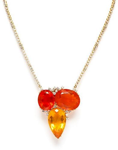 An 18 Karat Yellow Gold, Fire Opal and Diamond Pendant/Brooch with Removable Platinum and Diamond Chain, 28.00 dwts.