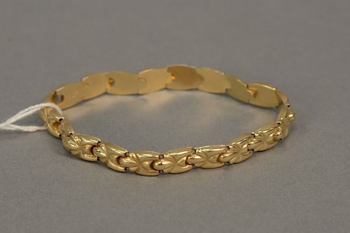 14 karat gold bracelet with internal stretch bands.