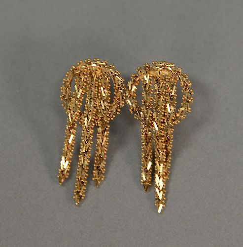 Pair of 14 karat gold earrings. 11 grams