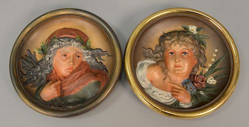 Pair of round three dimensional Bradley & Hubbard plaques of woman. dia. 8 1/2in.